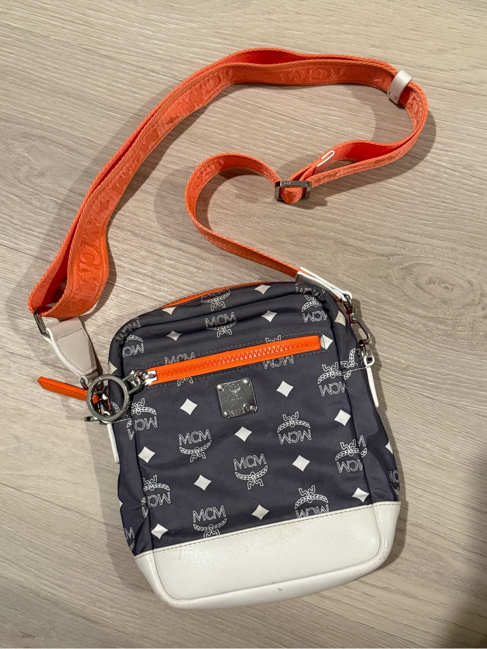 MCM Black Logo Crossbody with Orange Strap and White Trim